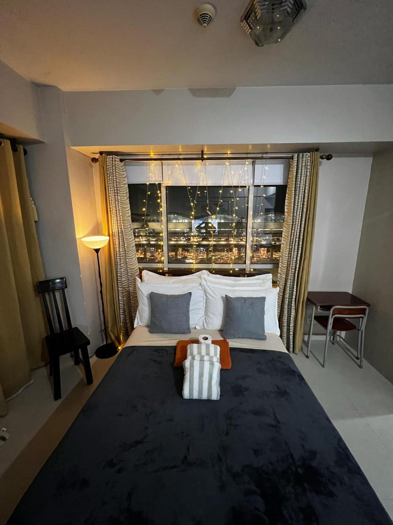 One Palm Tree Villas Condominium - Studio 7Th Fl With Balcony - Across Terminal 3 Airport Пасай Экстерьер фото